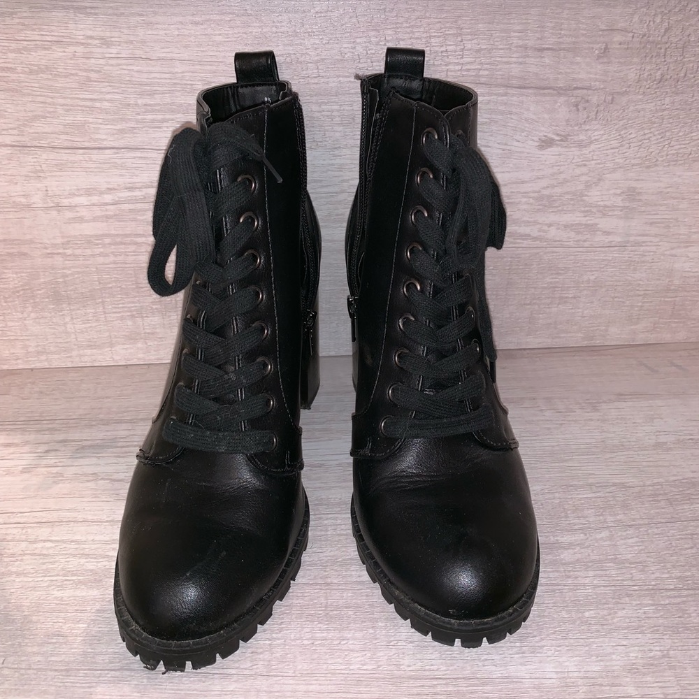 Black high heeled combat boots